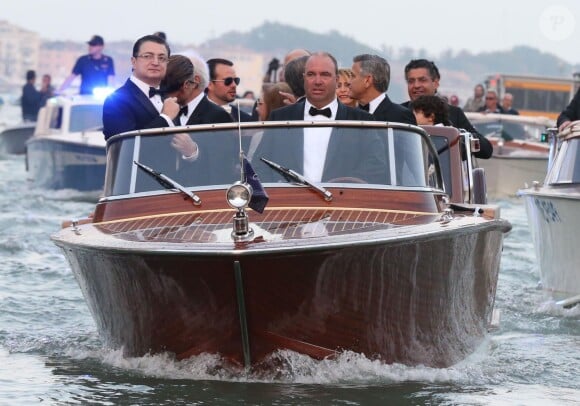 Mariage de George Clooney, en route avec ses amis, et Amal Alamuddin à l'Aman Canal Grande Venice à Venise, le 27 septembre 2014.
