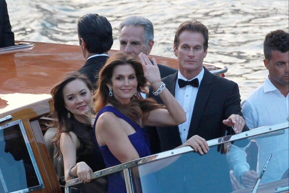 Cindy Crawford et Rande Gerber en bateau-taxi. Mariage de George Clooney et Amal Alamuddin, célébré à l'Aman Canal Grande Venice à Venise, le 27 septembre 2014.