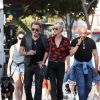 Johnny Hallyday et sa femme Laeticia sont allés se promener en moto aux alentours de Los Angeles. À leurs côtés, Daniel, le coach du rockeur. Le couple a déjeuné en amoureux chez "Blue Plate" à Santa Monica, avant de se faire prendre en photo devant la plage de Santa Monica, le 27 septembre 2014.
