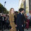 Natalia Vodianova et Antoine Arnault arrivent à la Fondation Louis Vuitton pour assister au défilé Louis Vuitton printemps-été 2015. Paris, le 1er octobre 2014.