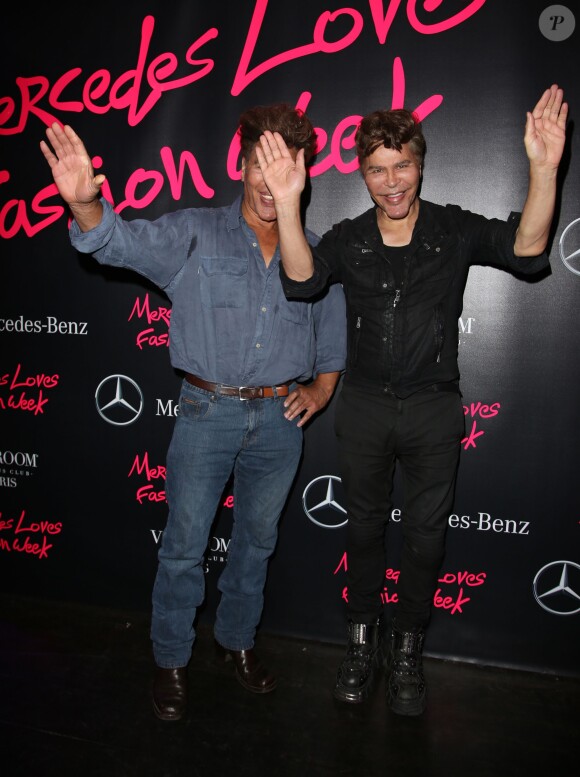 Igor et Grichka Bogdanoff (Bogdanov) à la Closing Party de la Fashion Week prêt-à-porter collection Printemps-Eté 2015 organisée par Mercedes-Benz, partenaire officiel de la Semaine des créateurs de mode, au Vip Room à Paris, le 1er octobre 2014.