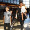 David Beckham et ses enfants Romeo, Cruz, et Harper quittent l'aéroport de LAX à Los Angeles, le 29 aout 2014