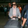 Kim Kardashian arrive, avec sa fille North, à l'aéroport LAX de Los Angeles. Le 2 octobre 2014