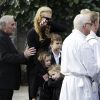 Les obsèques du père de Nicole Kidman, Antony, à North Shore près de Sydney en Australie, en l'église Saint-François-Xavier, le 19 septembre 2014. L'actrice, avec ses filles Sunday et Faith, ne peut retenir ses larmes