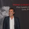 Gilbert Melki - Photocall à l'occasion de l'hommage à Pedro Almodovar qui reçoit le Prix Lumière 2014 à Lyon le 17 octobre 2014