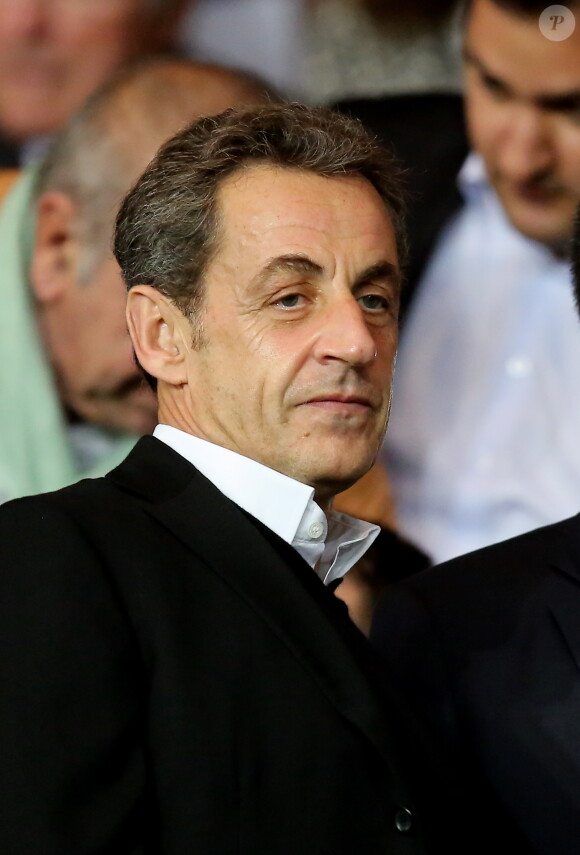 Nicolas Sarkozy - People assistent au match PSG-Barcelone de la Ligue des Champions 2014 au parc des princes à Paris le 30 septembre 2014.