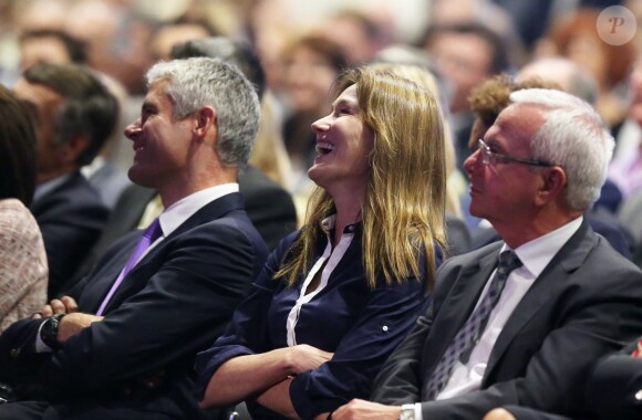 Laurent Wauquiez et Carla Bruni-Sarkozy assistent au meeting de Nicolas Sarkozy à Nice le 21 octobre 2014.