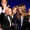 Christian Estrosi, Nicolas Sarkozy, Carla Bruni, Eric Ciotti, Laurent Wauquiez prennent la pause après la réunion publique de Nicolas Sarkozy à Nice le 21 octobre 2014.