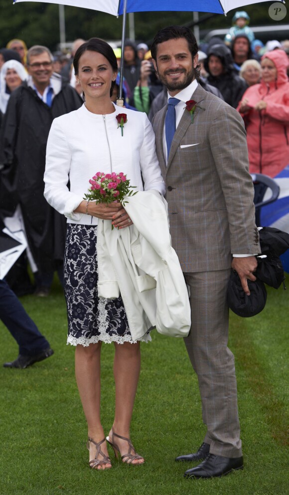 Sofia Hellqvist et le prince Carl Philip de Suède lors des 37 ans de la princesse Victoria. Leur mariage aura lieu le 13 juin 2015.