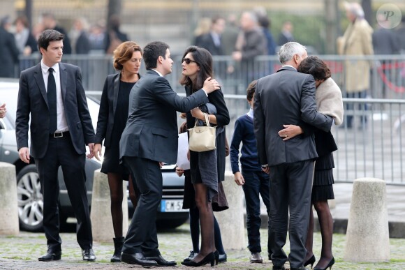 Bernadette Prud'hommes et ses enfants Laetitia, Diane et Fabrice lors des obsèques de son époux Christophe de Margerie, président de Total décédé dans un accident d'avion, en l'église Saint-Sulpice à Paris, le 27 octobre 2014