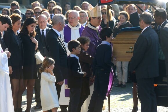 Les enfants Christophe de Margerie, Fabrice, Laeticia et Diane et leurs enfants lors de ses obsèques, en l'église Saint-Sulpice à Paris, le 27 octobre 2014
