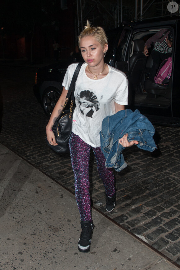 Miley Cyrus à la sortie d'un immeuble à New York, le 7 septembre 2014.