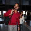 Will Smith et sa femme Jada Pinkett Smith prennent l'avion a Los Angeles le 31 decembre 2013. Le couple semble detendu et souriant malgre les rumeurs de separation.  Will Smith and wife Jada Pinkett Smith are seen making their way through LAX airport. Following persistent rumours about their marriage the couple looked happy and relaxed as they smiled for waiting photographers.31/12/2013 - LA
