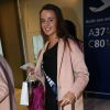 Semi-Exclusif - Maïlys Bonnet (Miss Bretagne 2014) au départ de l'aéroport de Paris-Charles-de-Gaulle à destination de Punta Cana, le 14 novembre 2014.