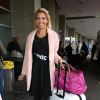 Semi-Exclusif - Marie Fabre (Miss Languedoc) au départ de l'aéroport de Paris-Charles-de-Gaulle à destination de Punta Cana, le 14 novembre 2014.