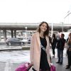 Semi-Exclusif - Mélissa Cervoni (Miss Champagne-Ardenne 2014) au départ de l'aéroport de Paris-Charles-de-Gaulle à destination de Punta Cana, le 14 novembre 2014.