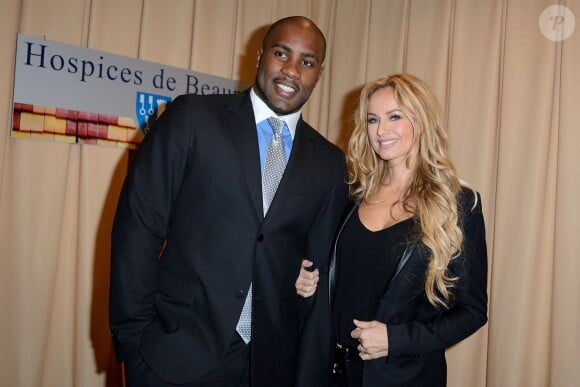 Teddy Riner et Adriana Karembeu lors de la 154e vente aux enchères des Hospices de Beaune, le 16 novembre 2014 à Beaune
