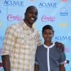 Dwight Howard et son fils Braylon, lors des Teen Choice Awards 2013 au Gibson Amphitheatre de Los Angeles, le 11 août 2013