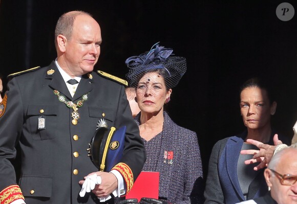 Le prince Albert II, la princesse Caroline et la princesse Stéphanie de Monaco à la sortie de la cathédrale de Monaco après la messe d'action de grâce célébrée par Monseigneur Barsi pour la fête nationale, le 19 novembre 2014
