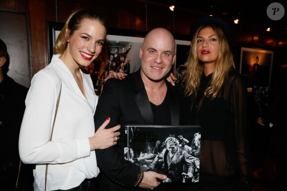 Renaud Corlouer et sa femme, Isabelle Funaro - Soirée de lancement du livre "Johnny Hallyday on the road" de Renaud Corlouer au Buddha-Bar à Paris, le 18 novembre 2014.