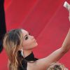 Nabilla Benattia (selfie) - Montée des marches du film "The Homesman" lors du 67 ème Festival du film de Cannes – Cannes le 18 mai 2014.