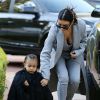 Kim Kardashian et sa fille North West, très lookées, étaient de sortie le 28 novembre 2014 à Los Angeles