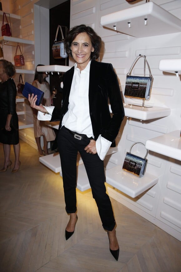 Inès de La Fressange - Cocktail Roger Vivier en l'honneur de Ambra Medda, nouveau visage de la collection Automne Hiver 2014-2015, dans la boutique Roger Vivier rue Saint-Honoré à Paris, lors de la Fashion Week, le 30 septembre 2014.