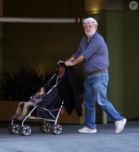 George Lucas avec sa fille Everest à Beverly Hills, Los Angeles, le 28 novembre 2014.