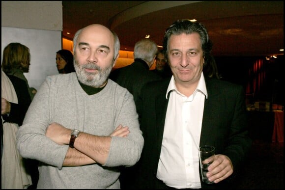 Gérard Jugnot et Christian Clavier lors de la projection du film Les Bronzés 3 à Paris le 18 janvier 2006