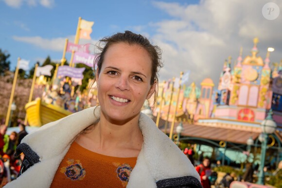 Laure Manaudou au parc Disneyland Paris, fête le 50e anniversaire de l'attraction It's a small world.