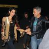 George Clooney et sa femme Amal à Los Angeles, le 14 décembre 2014.