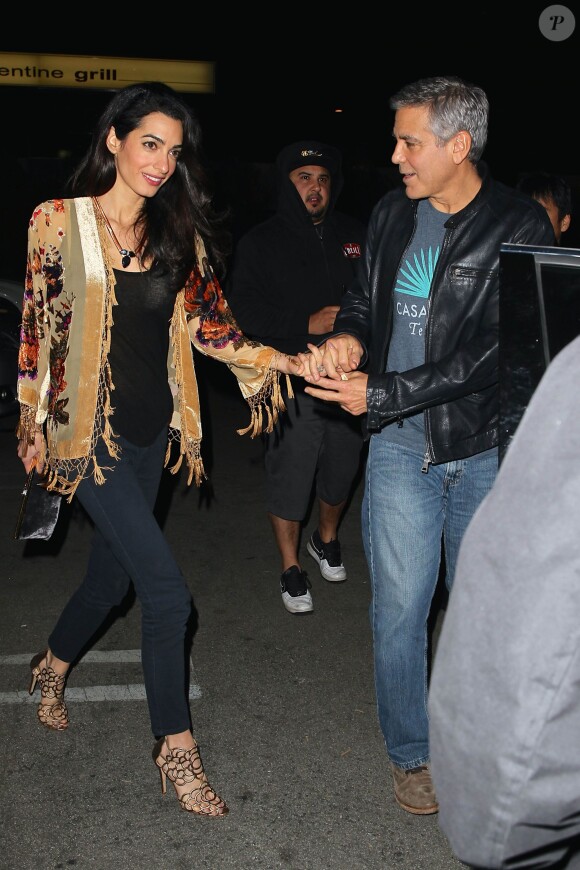 George Clooney et sa femme Amal à Los Angeles, le 14 décembre 2014.