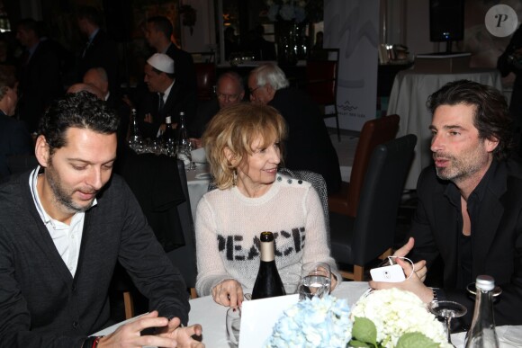 Exclusif - Catherine Barma et Richard Orlinski assistent à un événement organisé par Le Cercle des Médias, en présence de Shimon Peres, à Paris le 17 décembre 2014.