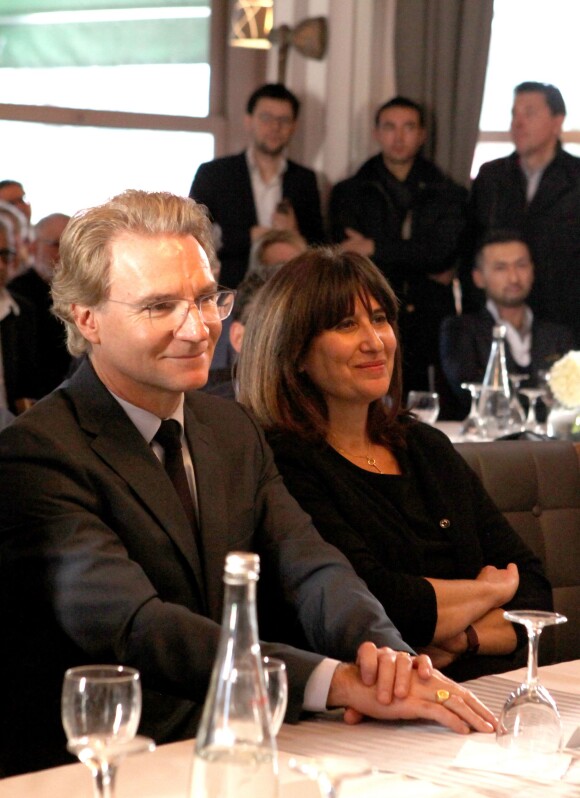 Exclusif - Olivier Royant (patron de Paris-Match) et Catherine Nayl (directrice générale adjointe de l'information de TF1) assistent à un événement organisé en l'honneur de Shimon Peres par Le Cercle des Médias, à Paris le 17 décembre 2014.