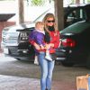 Fergie et son mari Josh Duhamel vont faire du shopping avec leur fils Axl à Los Angeles, le 21 décembre 2014.