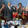 Barack Obama, son épouse Michelle, leurs filles Malia et Sasha au côté de la chanteuse Rita Ora lors de l'enregistrement du concert Christmas in Washington à Washington, le 14 décembre 2014