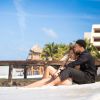 Le fils d'eddie Murphy, Eric Murphy pose en compagnie de sa petite-amie Daisy Espana sur les plages de Cancun à Mexico, le 3 janvier 2015.