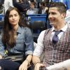 Cristiano Ronaldo et sa compagne Irina Shayk lors d'un match de basket à Madrid en Espagne le 20 mars 2014
