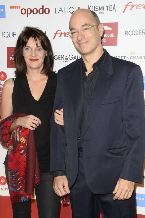 Bernard Werber et sa compagne Isabelle assistent à la soirée de Gala du Prix d'Amérique Opodo à la Maison de l'UNESCO à Paris le 24 janvier 2015.