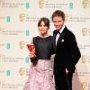Felicity Jones et Eddie Redmayne - Pressroom lors de la cérémonie des British Academy Film Awards 2015 au Royal Opera House à Londres, le 8 février 2015.