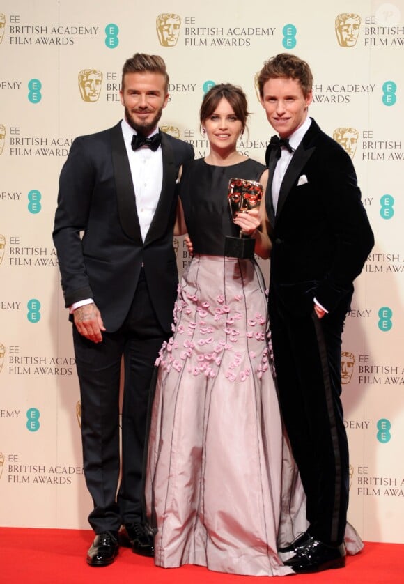 David Beckham, Felicity Jones et Eddie Redmayne - Pressroom lors de la cérémonie des British Academy Film Awards 2015 au Royal Opera House à Londres, le 8 février 2015.