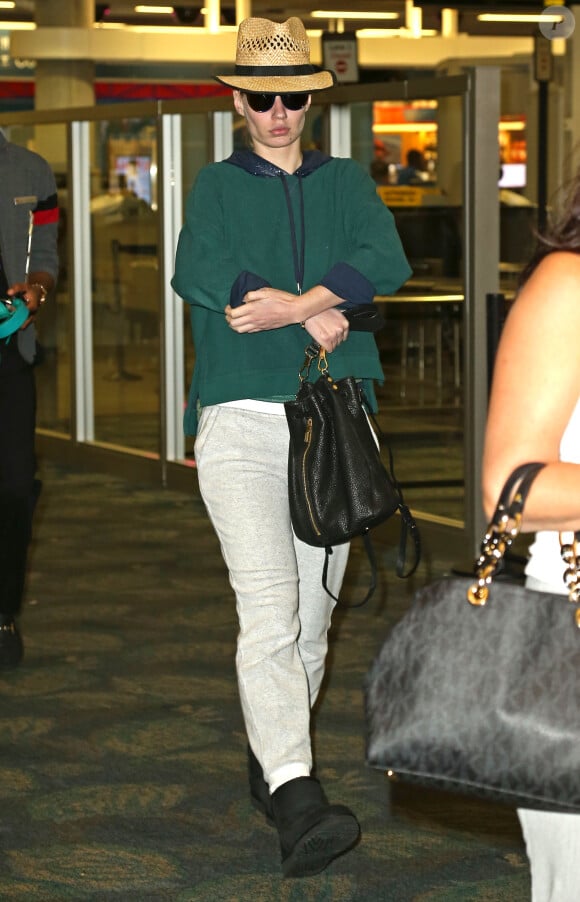 Exclusif - Iggy Azalea arrive à l'aéroport de Fort Lauderdale, le 21 décembre 2014.