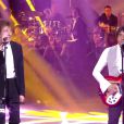 Alain Souchon et Laurent Voulzy sur la scène des 30e Victoires de la musique, au Zénith de Paris, le 13 février 2015.