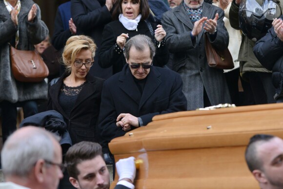 Julia Duchaussoy (fille de Corinne Le Poulain) et André Matheron (Mari de Corinne Le Poulain) - Obsèques de Corinne Le Poulain en l'église Saint-Roch à Paris le 16 février 2015.