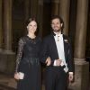 Le prince Carl Philip de Suède et sa fiancée Sofia Hellqvist le 11 février 2015 au palais royal à Stockholm, pour le premier dîner officiel de l'année.