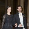 Le prince Carl Philip de Suède et sa fiancée Sofia Hellqvist le 11 février 2015 au palais royal à Stockholm, pour le premier dîner officiel de l'année.