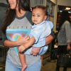 Kim Kardashian et sa fille North à l'aéroport de Burbank, le 7 août 2014.
