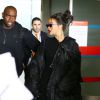 La chanteuse Rihanna arrive à l'aéroport Roissy Charles de Gaulle à Paris. Le 7 mars 2015.