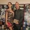Eros Ramazzotti et sa femme Marica Pellegrinelli au défilé de mode Valentino à Paris, le 25 juin 2014.