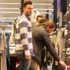 Le chanteur Adam Levine et Behati Prinsloo font shopping dans la boutique Nike store de Soho, à New York, le 4 mars 2015